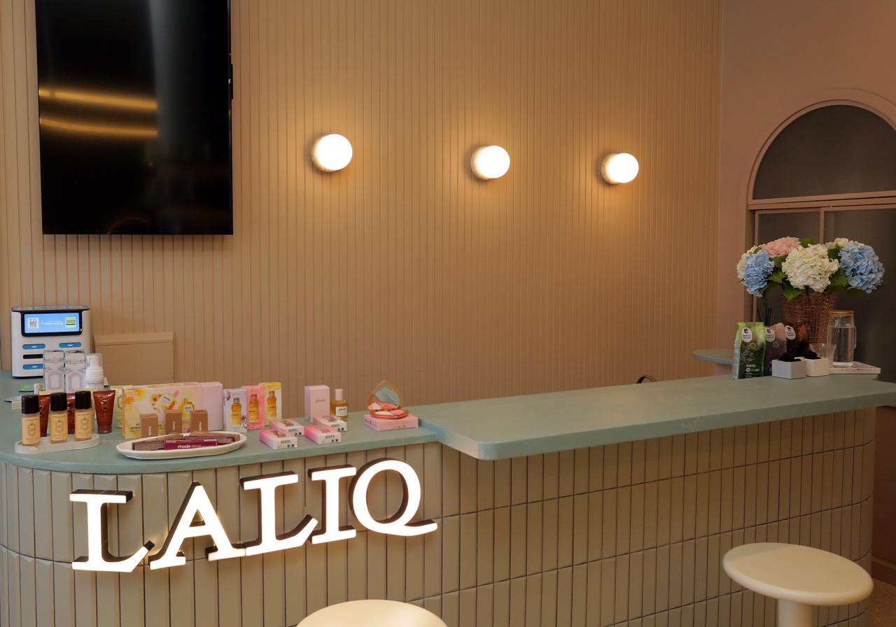 LALIQ reception with mint counter and illuminated logo